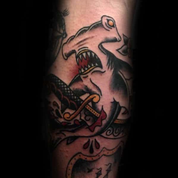 Guys Traditional Dagger And Shark Leg Tattoo