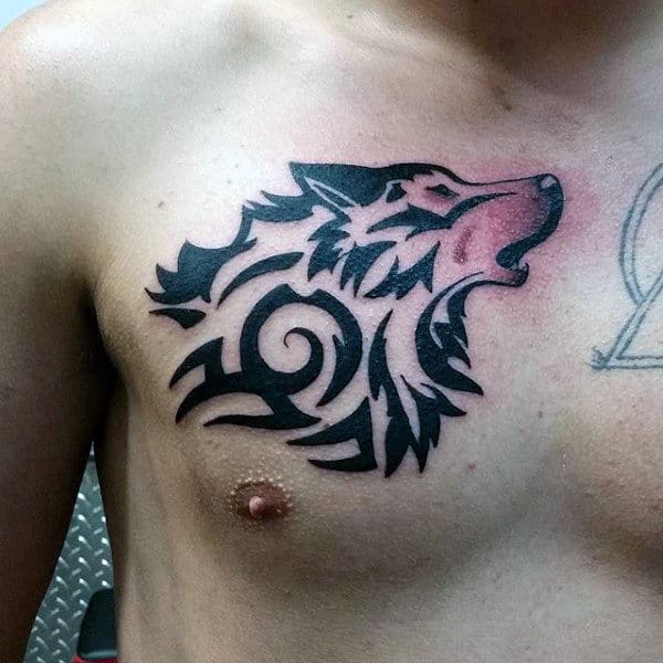 Guys Tribal Wolf Chest Tattoo Design Inspiration