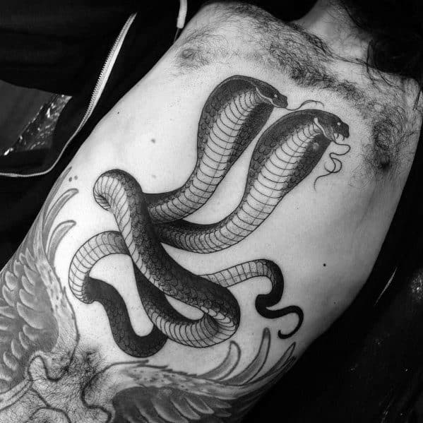 Guys Two Headed Snake Tattoos On Chest