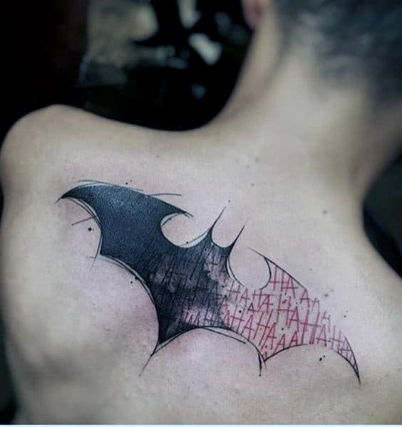 Guys Upper Back Batman Symbol With Ha Ha Lettering Design Tattoo