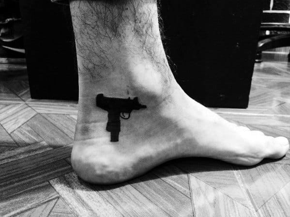 Guys Uzi Tattoos On Foot