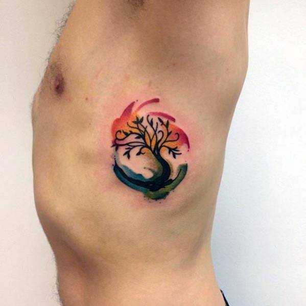 guys-watercolor-small-tree-colorful-rib-cage-side-tattoo