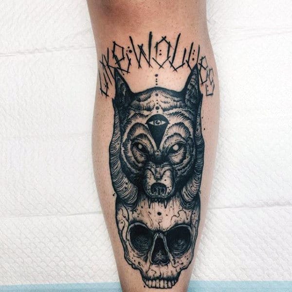 Guys Wolf And Skull Shin Tattoo Designs