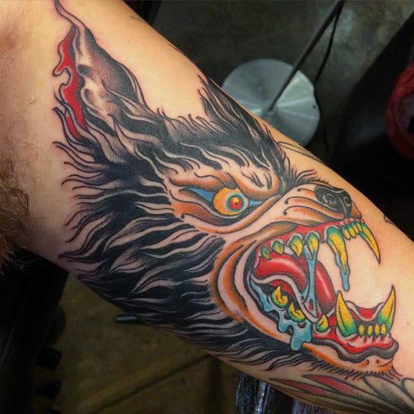 Hairy Werewolf With Shiny Yellow Teeth Tattoo Male Forearm