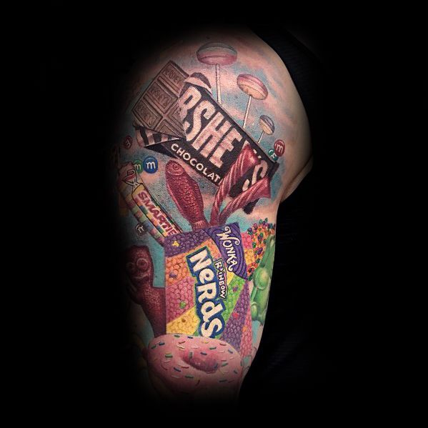 Half Sleeve Candy Themed Tattoo On Man
