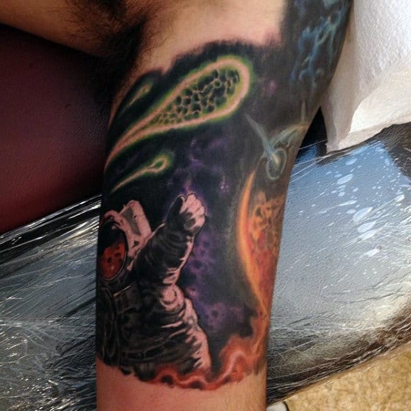 Half Sleeve Mens Green Comet And Astronaut Tattoo Design