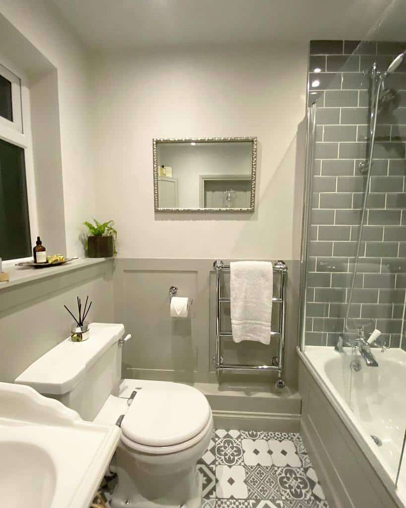 gray half wall paneling bathroom shower 