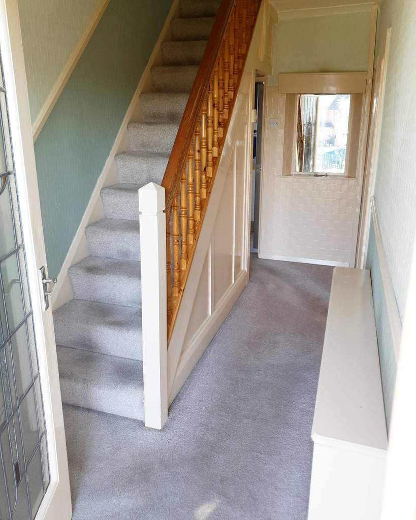 hallway wall paneling wood banister