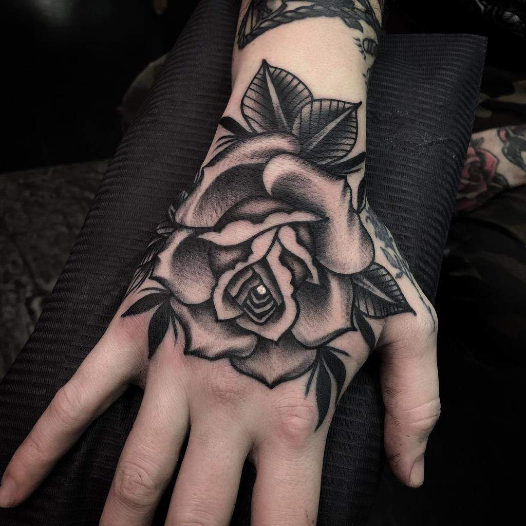 1. Negative Space and Black Rose Tattoo Ideas.