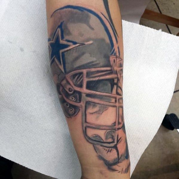 Hand Holding Dallas Cowboys Helmet Mens Football Forearm Tattoo
