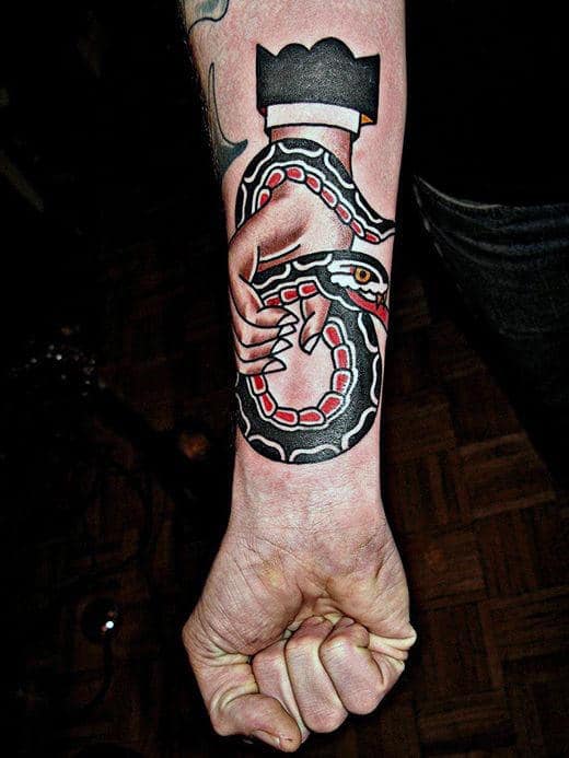 Hand Holding Snake Mens Traditional Inner Forearm Tattoo