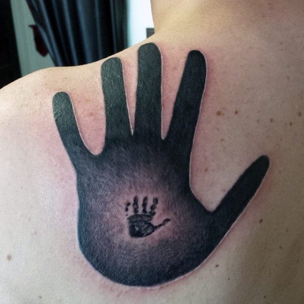 Hand In Handprint Mens Upper Back Tattoos
