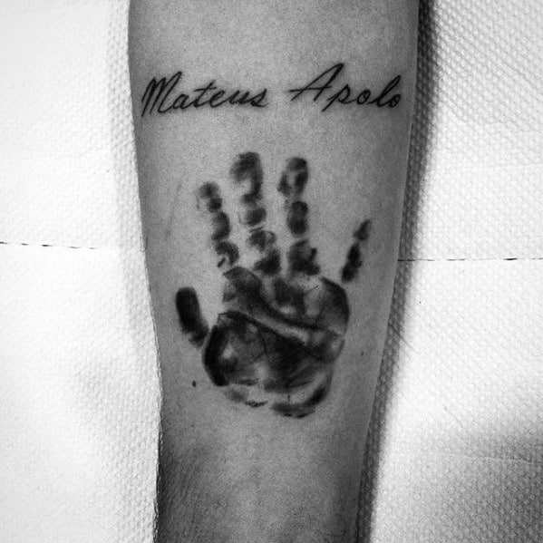 hand print with kids name mens inner forearm tattoo