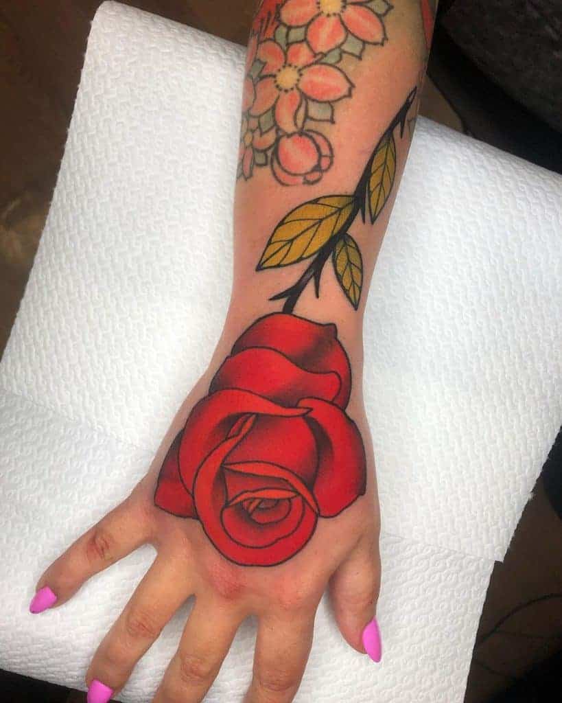 hand-red-rose-tattoos-mate_tattooer-1229×1536-1