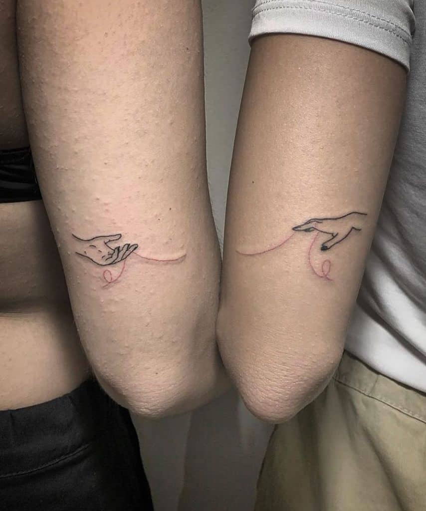 Hand String Friendship Tattoo