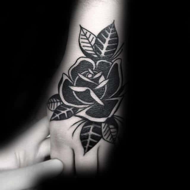 Hand Tattoo Of Black Rose On Male