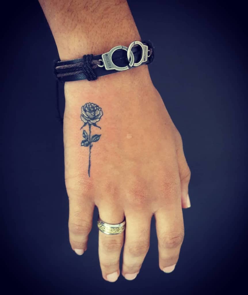 hand tiny rose tattoos magikbox_tattoos