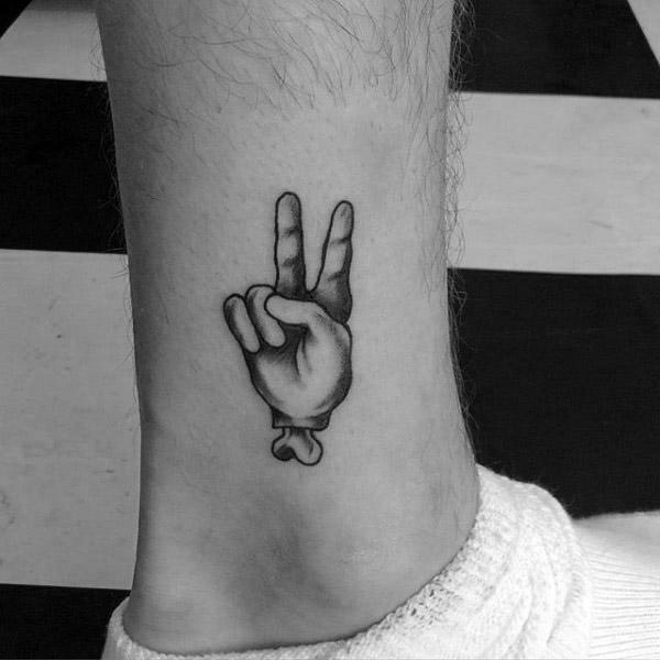 Hand With Bone Peace Sign Mens Lower Leg Tattoos
