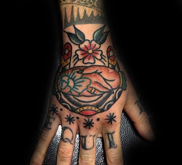 Hand With Horseshoe Traditional Handshake Tattoo Ideas For Gentlemen