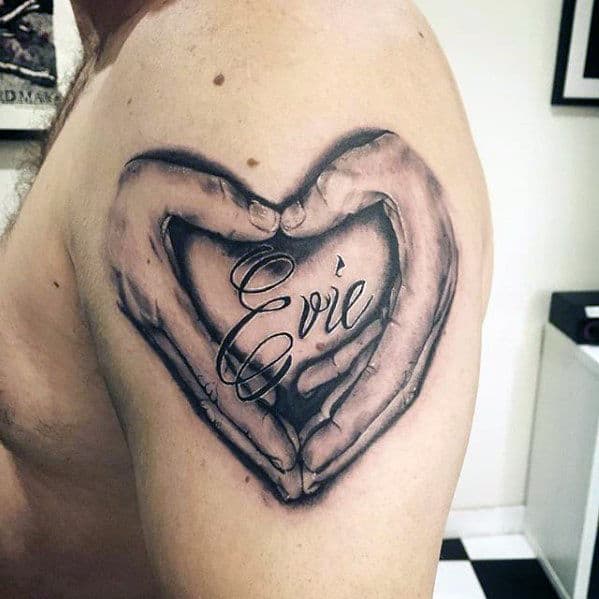 hands in shape of heart with evie kids name upper arm tattoo ideas for men