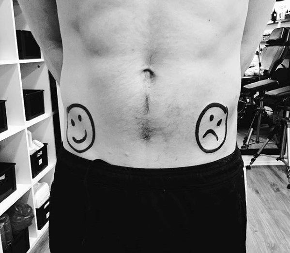 Happy And Sad Faces Emoji Tattoos For Gentlemen On Hips.