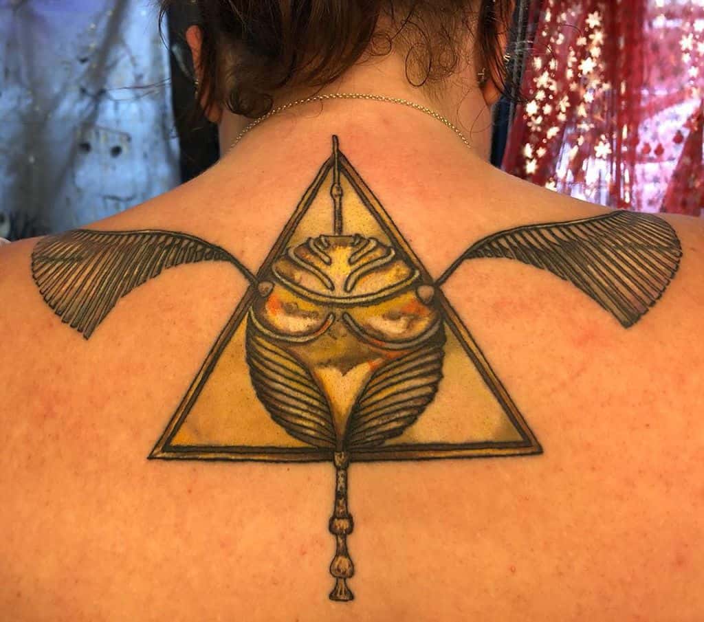 harry potter deathly hallows golden snitch tattoo