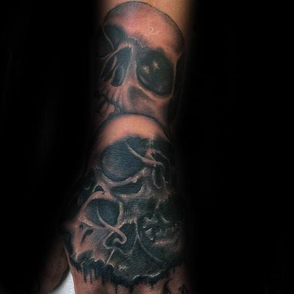 Haunted Skulls Mens Hand Tattoos
