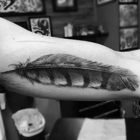 Hawk Feather Black Work Shaded Tattoo On Guys Bicep