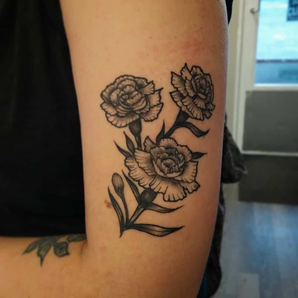 healed-flower-carnation-tattoo-tattoocartel.oulu