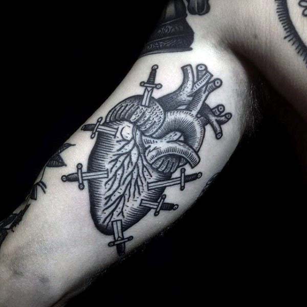 Heart With Daggers Woodcut Male Tattoo Ides On Bicep