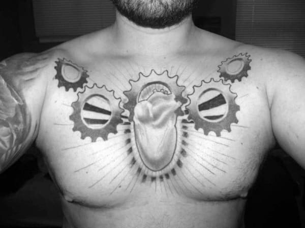Heart With Sprocket Mens Chest Tattoos