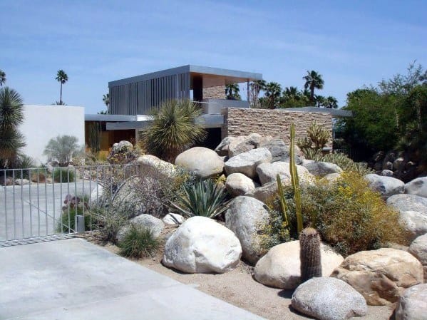 desert front yard with boulders and cacti 
