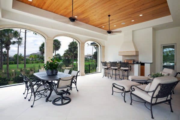 home patio roof ideas with wood ceiling and fireplace