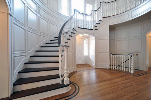 large ornate staircase in big home