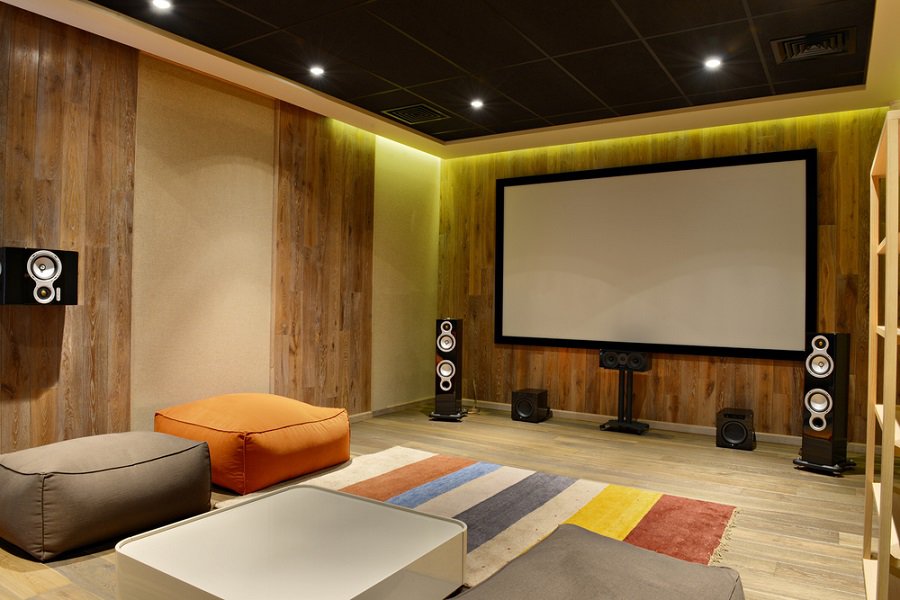 large cinema theater room with wood accents