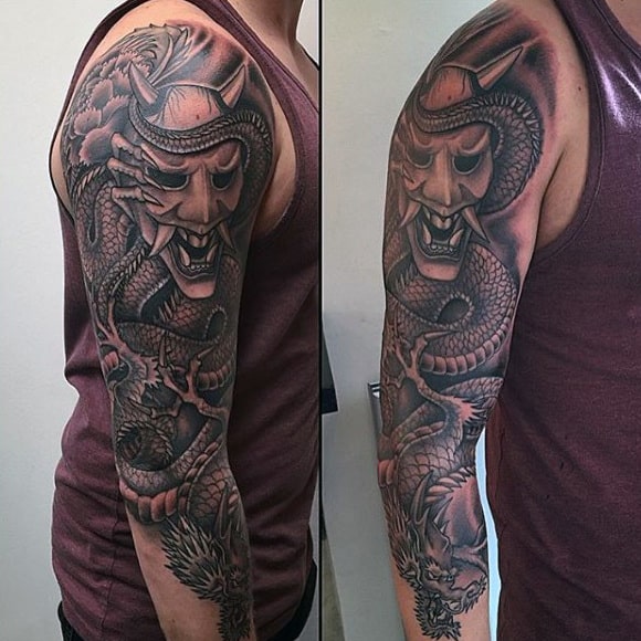 Horned Masked Face And Dragon Tattoo Mens Sleeve