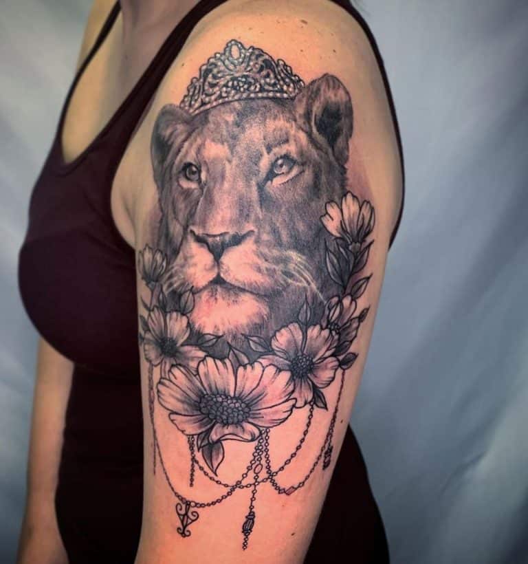 queen lioness with crown tattoo