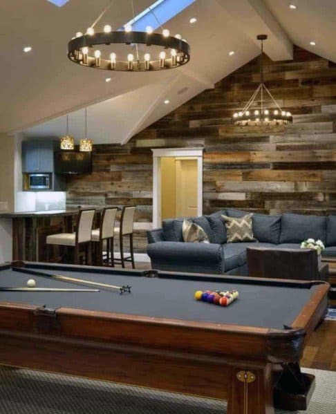 modern games room billiards table couch wood shiplap walls