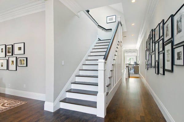 wooden staircase in modern home with trim