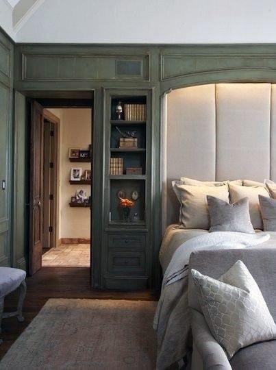built-in shelves green bedroom