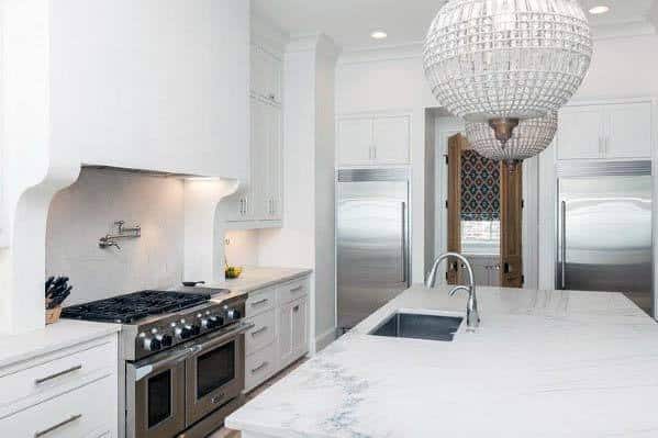 minimalist kitchen hood with glass chandeliers