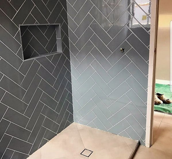 herringbone-patterned grey tiles 