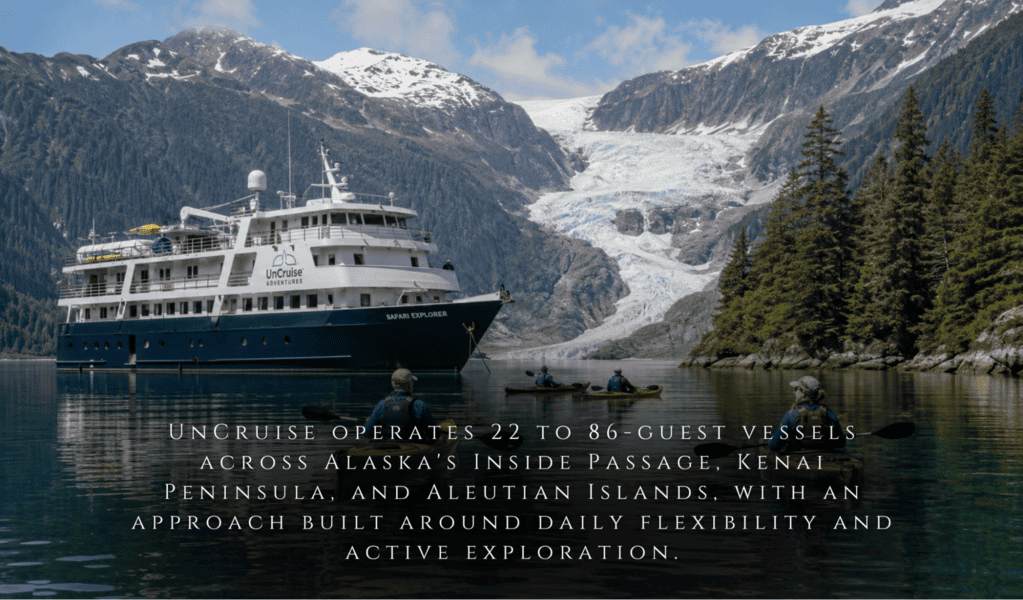 A cruise ship floats near a glacier in Southeast Alaska, with text promoting Uncruise’s remote access and active exploration voyages