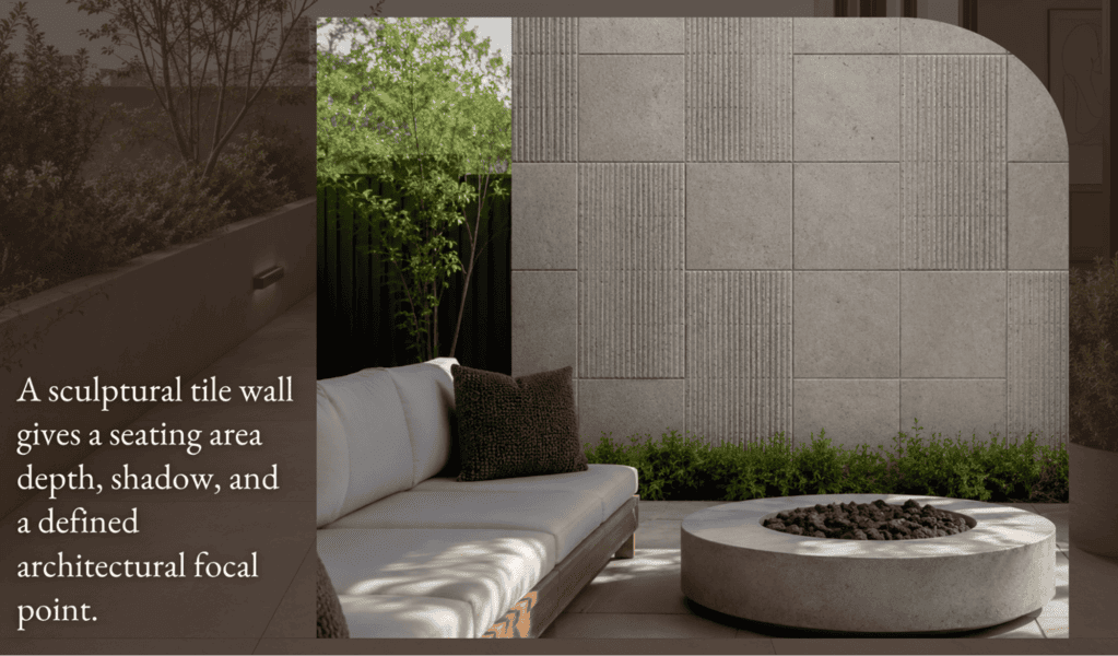 Modern backyard seating with a sculptural tile wall as the focal point, complemented by a fire pit and lush greenery