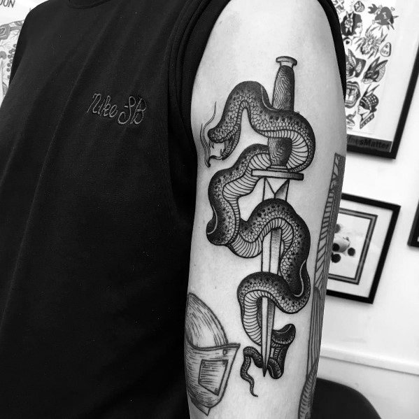 Impressive Male Snake Dagger Tattoo Designs