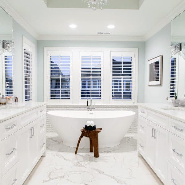 white bathroom with free standing tub