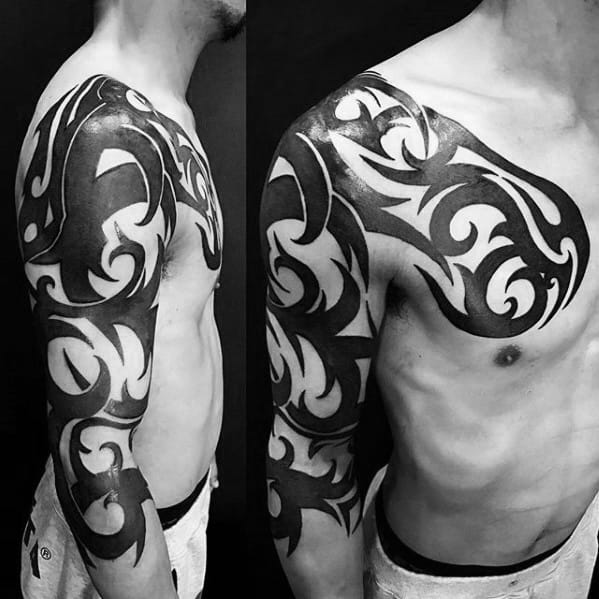 Incredible Black Ink Arm And Chest Badass Tribal Tattoos For Men