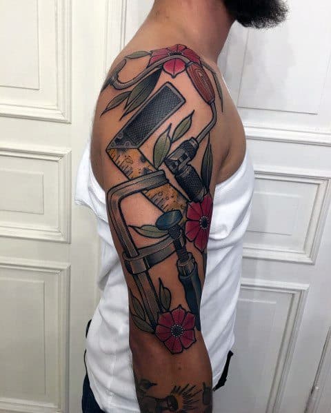 2. Arm Carpenter Tattoos.