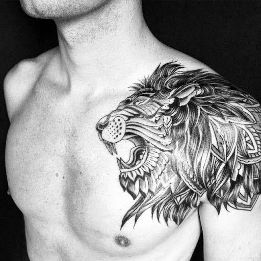 Incredible Male Shoulder Lion Tattoo