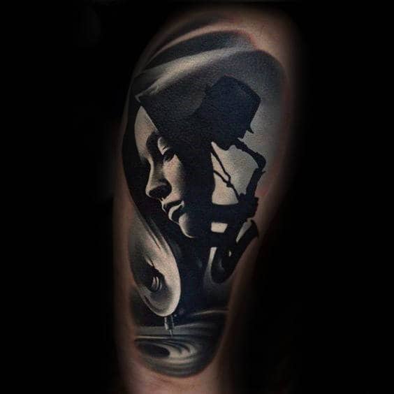 Incredible Mens Saxophone Thigh Tattoo With 3d Realistic Design